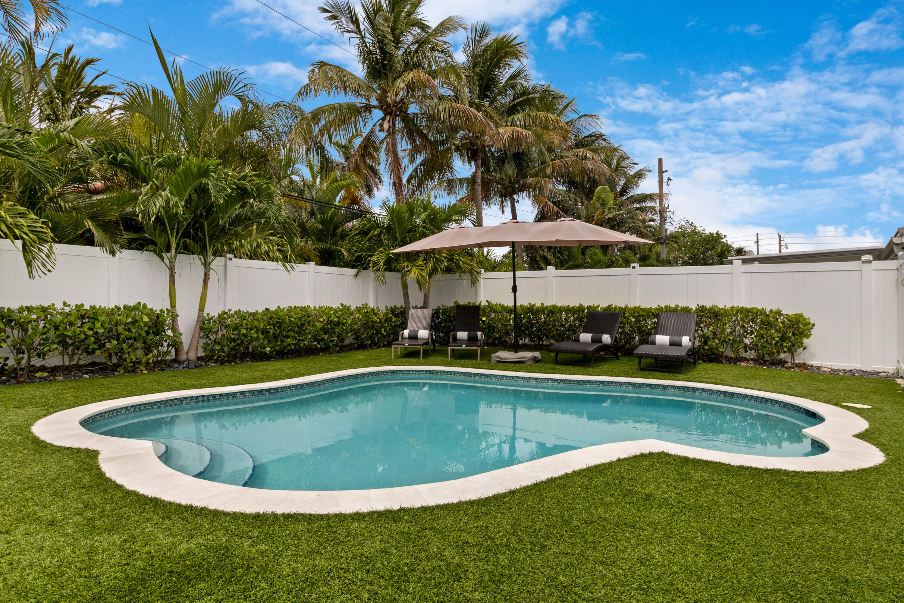 2862 Northeast 35th Court Lighthouse Point, FL 33064 - Photo 32 of 42 a view of outdoor space yard swimming pool and patio