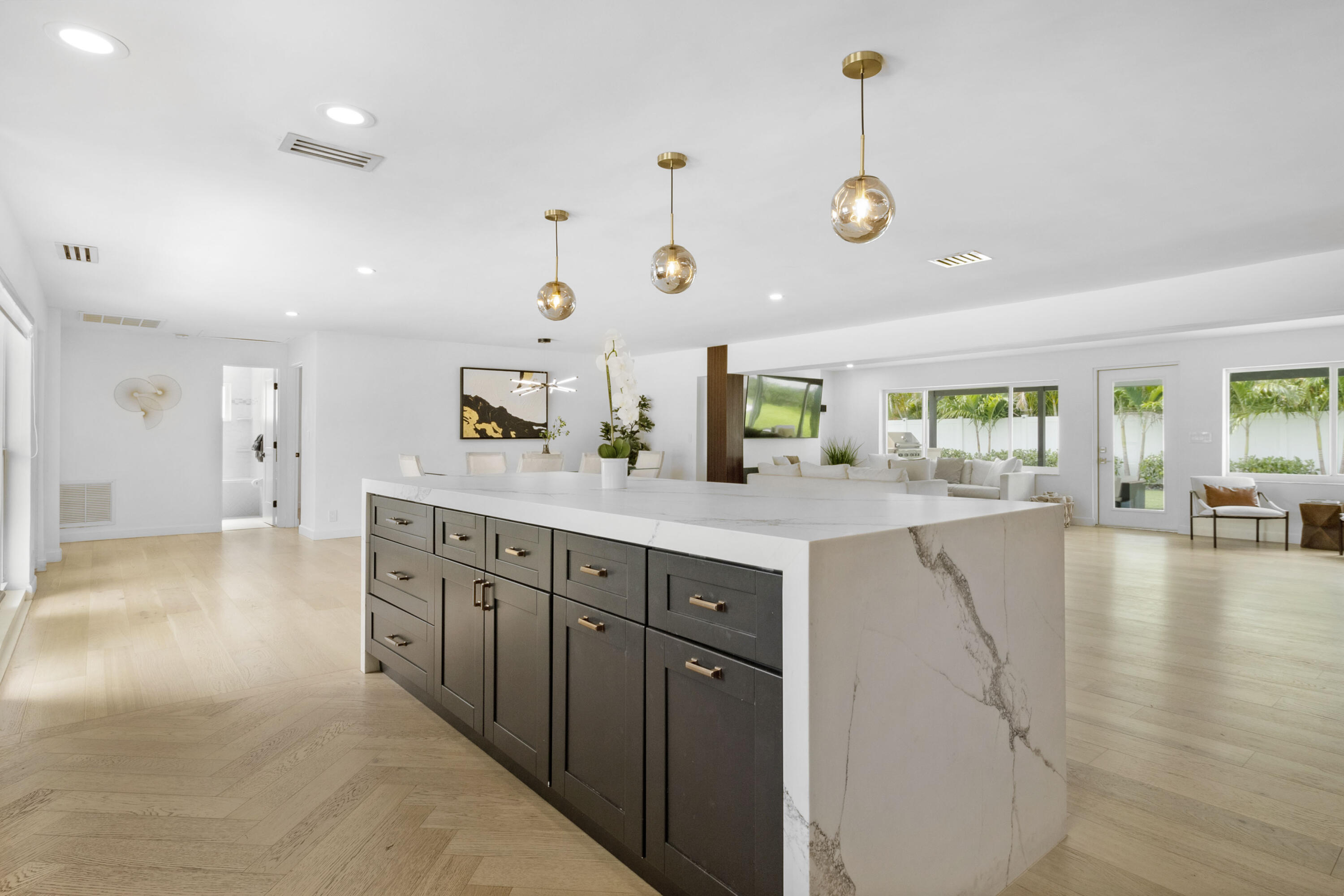 2862 Northeast 35th Court Lighthouse Point, FL 33064 - Photo 10 of 42 a kitchen with lots of counter space and window