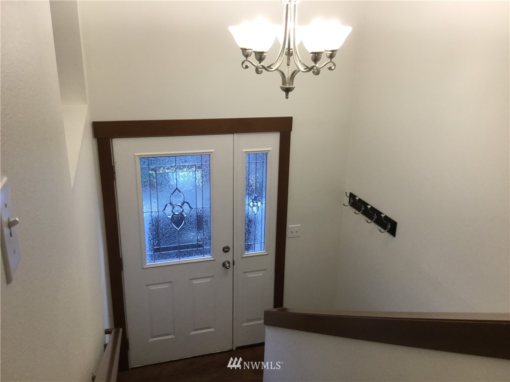 4606 Wood Place Everett, WA 98203 - Photo 3 of 37 a view of a hallway with a small space