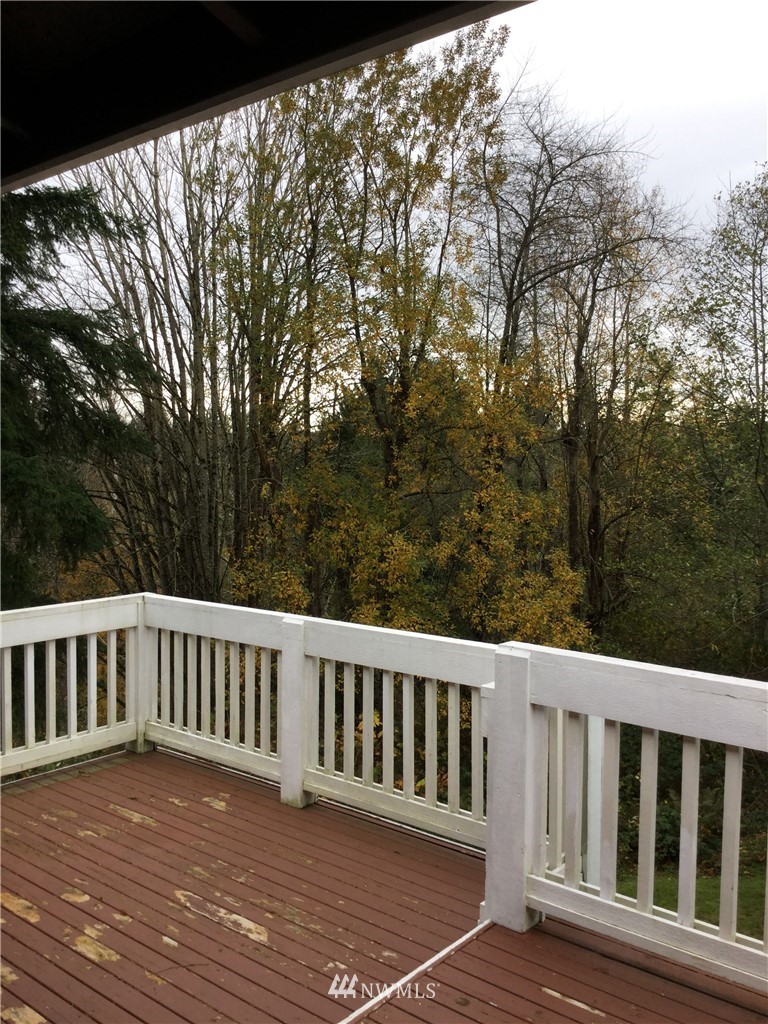 4606 Wood Place Everett, WA 98203 - Photo 29 of 37 a view of wooden deck and a yard