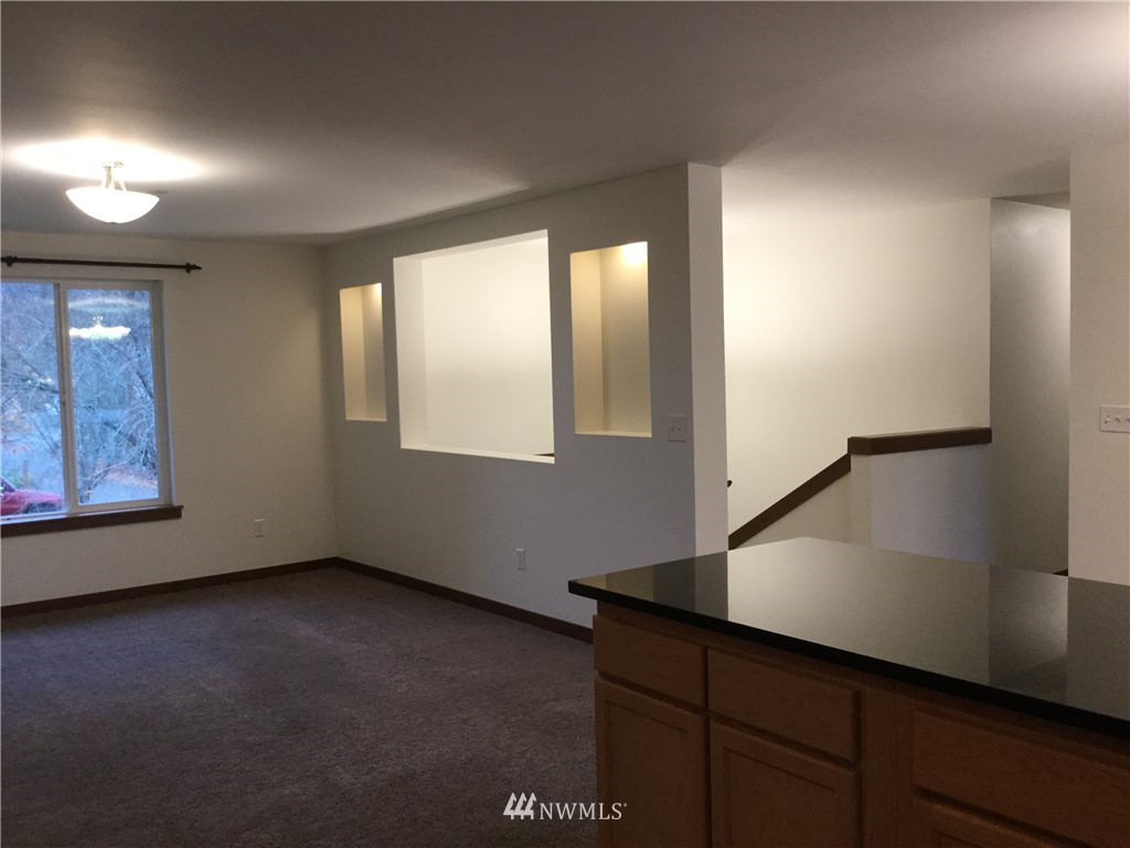 4606 Wood Place Everett, WA 98203 - Photo 10 of 37 an empty room with windows