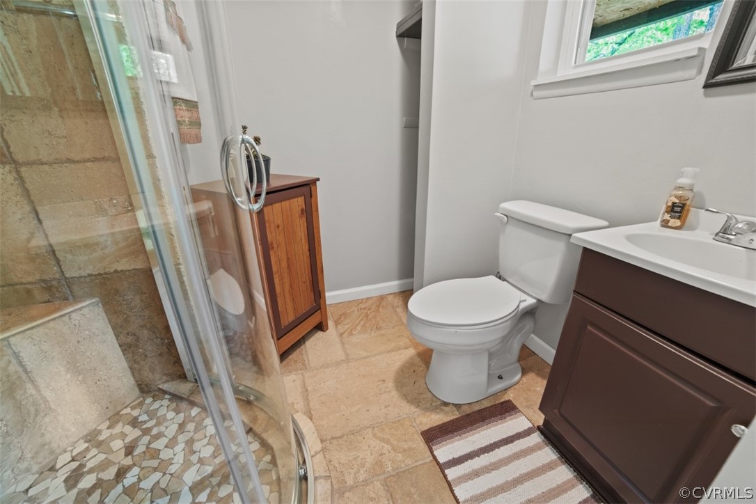 11901 West Petty Road Midlothian, VA 23113 - Photo 12 of 24 a bathroom with a sink and a toilet