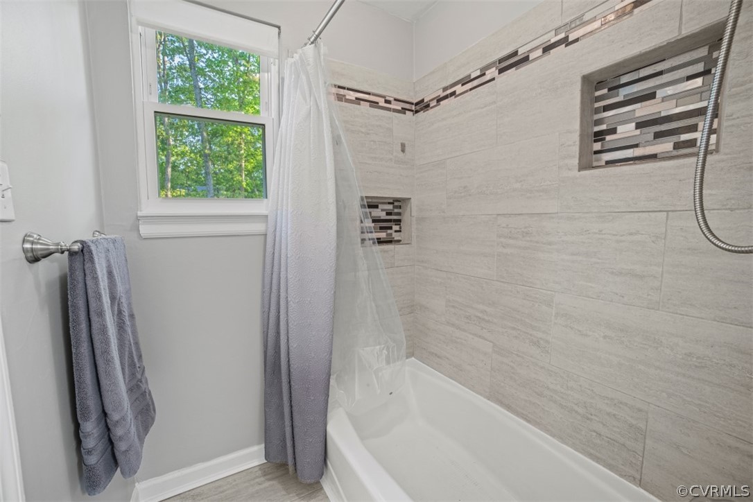 11901 West Petty Road Midlothian, VA 23113 - Photo 17 of 24 a bathroom with a bathtub