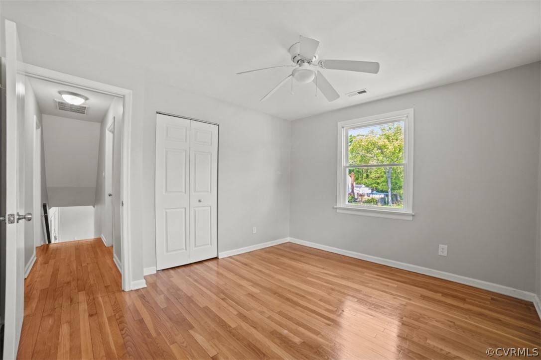 11901 West Petty Road Midlothian, VA 23113 - Photo 19 of 24 wooden floor in an empty room with a window