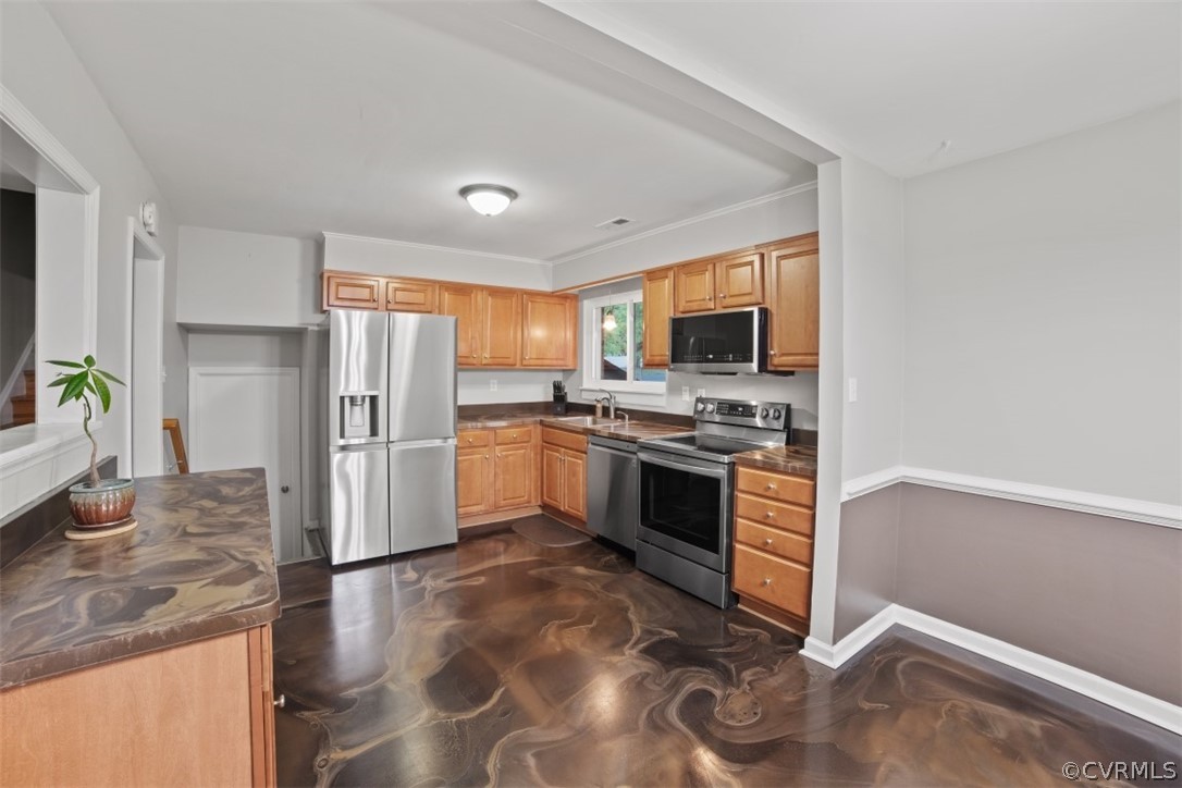11901 West Petty Road Midlothian, VA 23113 - Photo 3 of 24 a kitchen with granite countertop a refrigerator stove and sink