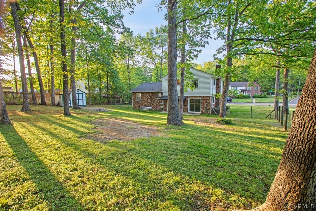 11901 West Petty Road Midlothian, VA 23113 - Photo 5 of 24 a swimming pool with outdoor seating and yard