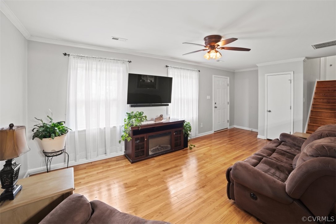 11901 West Petty Road Midlothian, VA 23113 - Photo 7 of 24 a living room with furniture and a flat screen tv