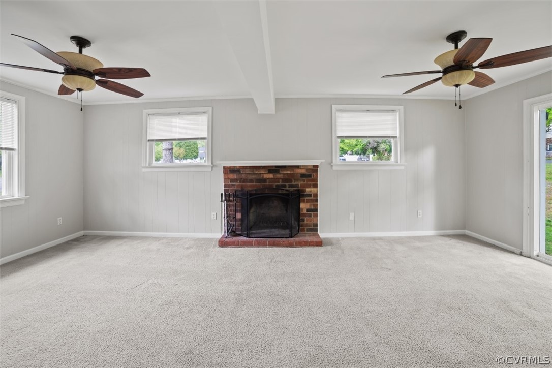 11901 West Petty Road Midlothian, VA 23113 - Photo 9 of 24 a view of empty room with fireplace and fan