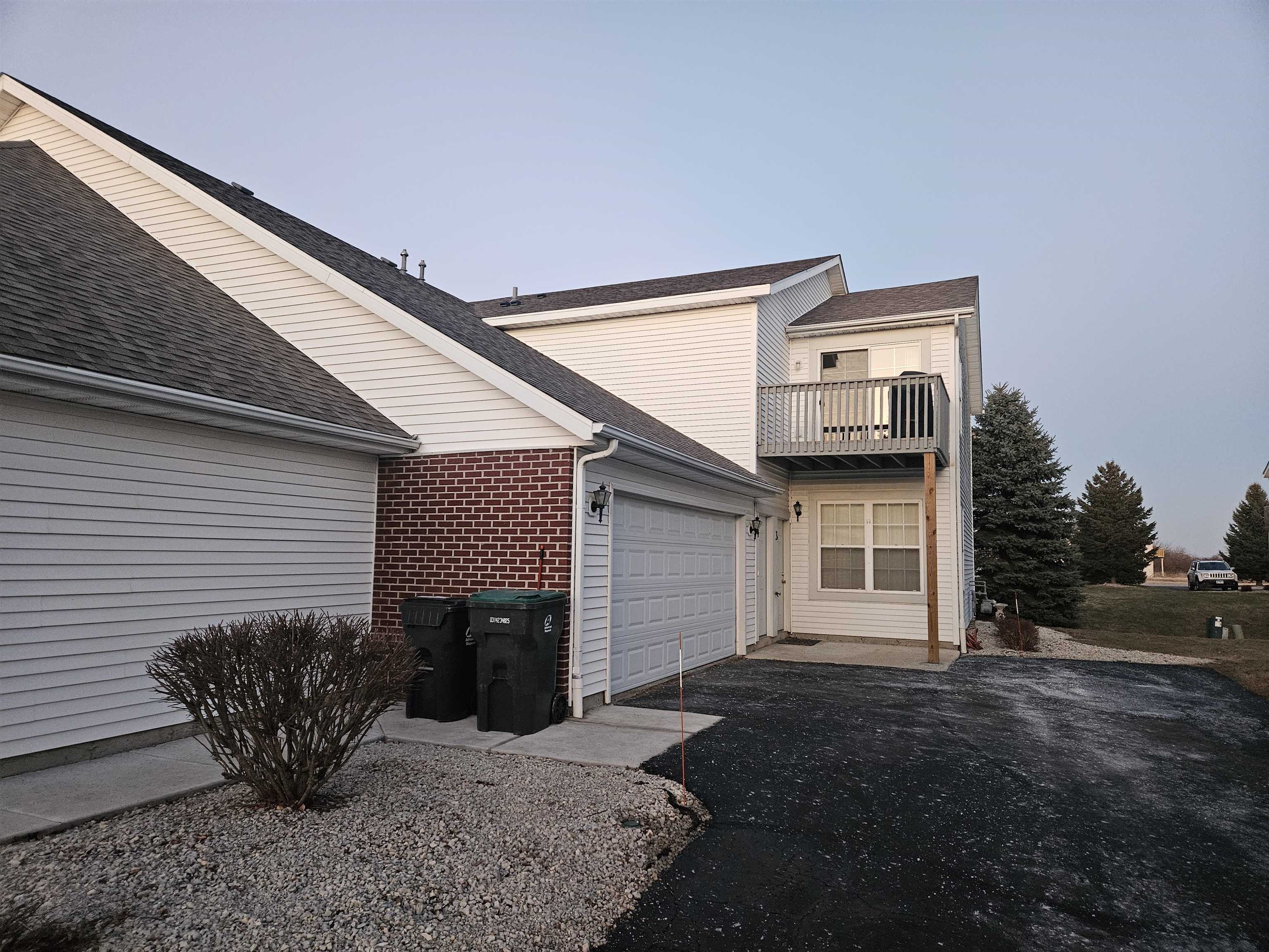 10167 Monarch Road Roscoe, IL 61073 - Photo 2 of 23 a view of a house with a patio