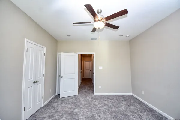 a bathroom with a toilet and a bathtub