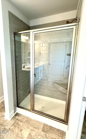 a white toilet sitting next to a window