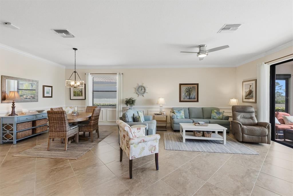 10475 Medjool Drive Venice, FL 34293 - Photo 14 of 71 a living room with furniture and a window