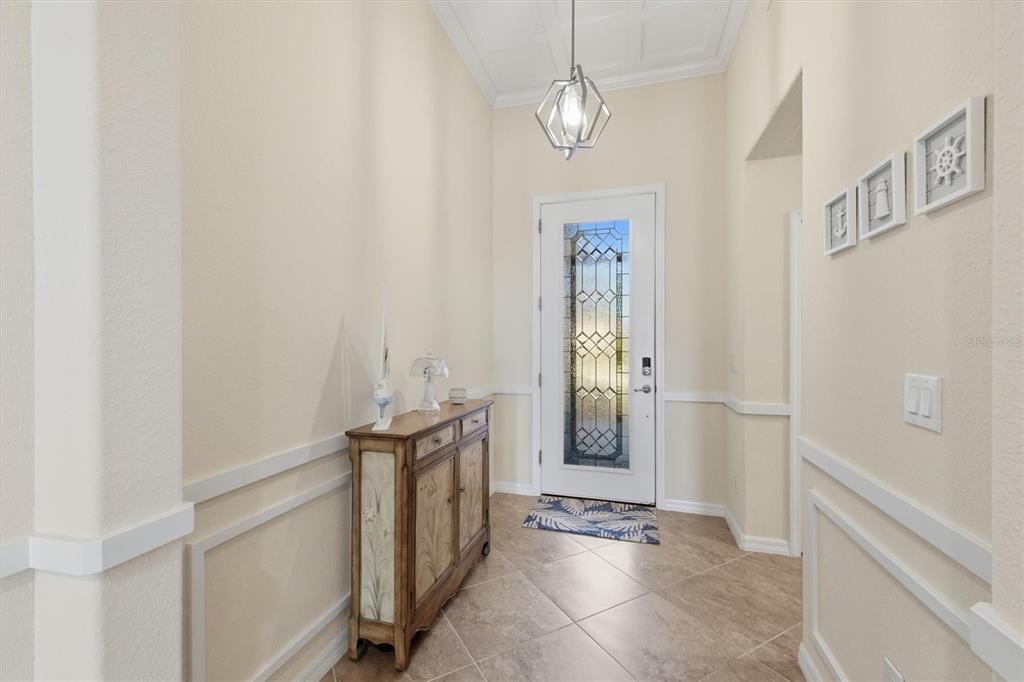 10475 Medjool Drive Venice, FL 34293 - Photo 30 of 71 a view of a hallway with windows