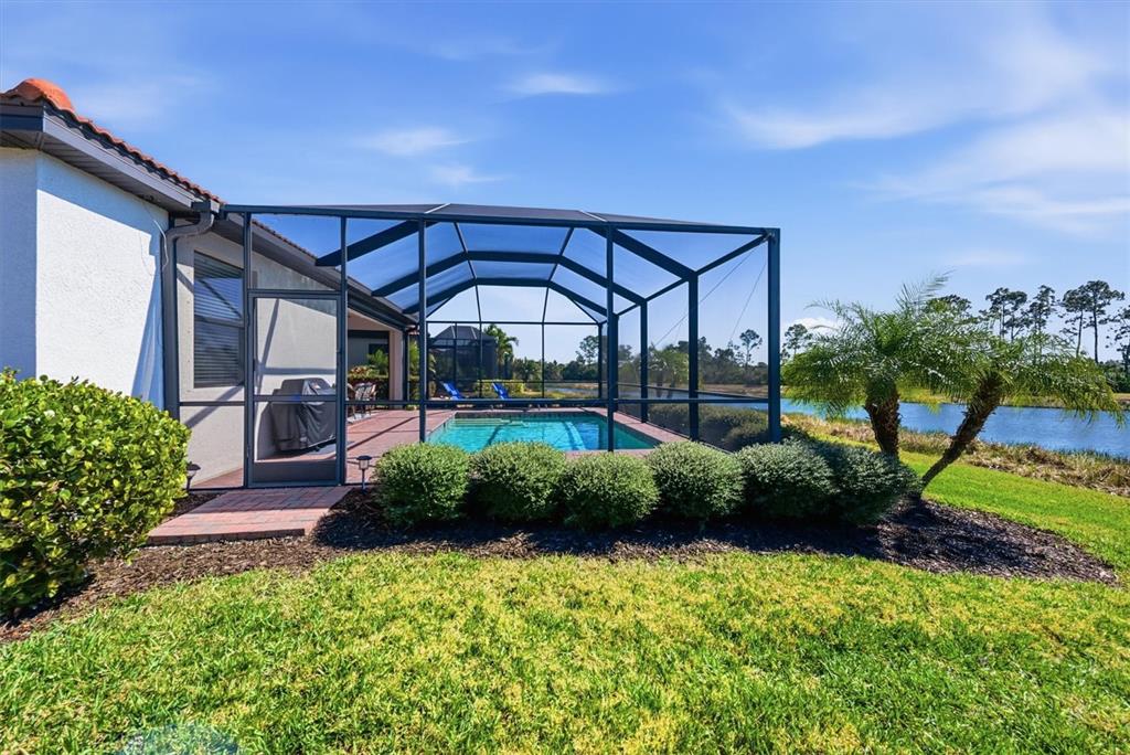 10475 Medjool Drive Venice, FL 34293 - Photo 49 of 71 a view of a garden area