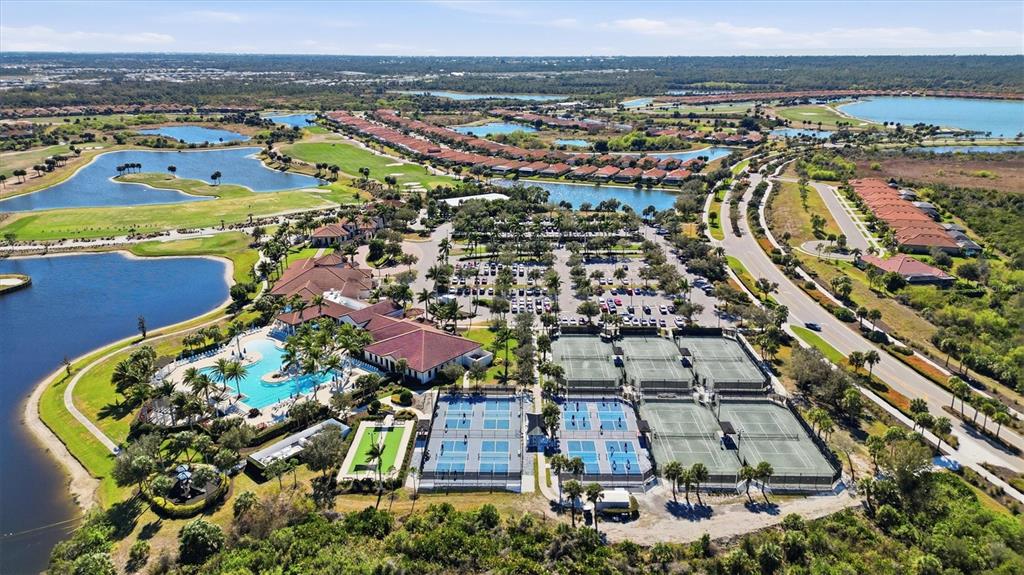 10475 Medjool Drive Venice, FL 34293 - Photo 70 of 71 an aerial view of multiple house