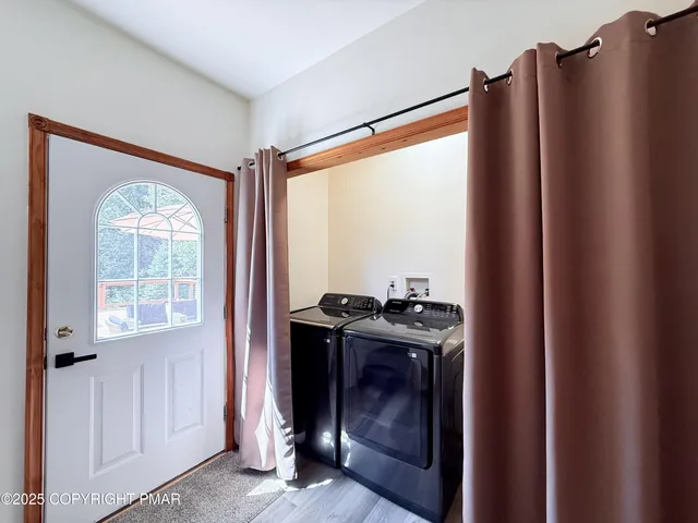 a kitchen with a stove and a refrigerator