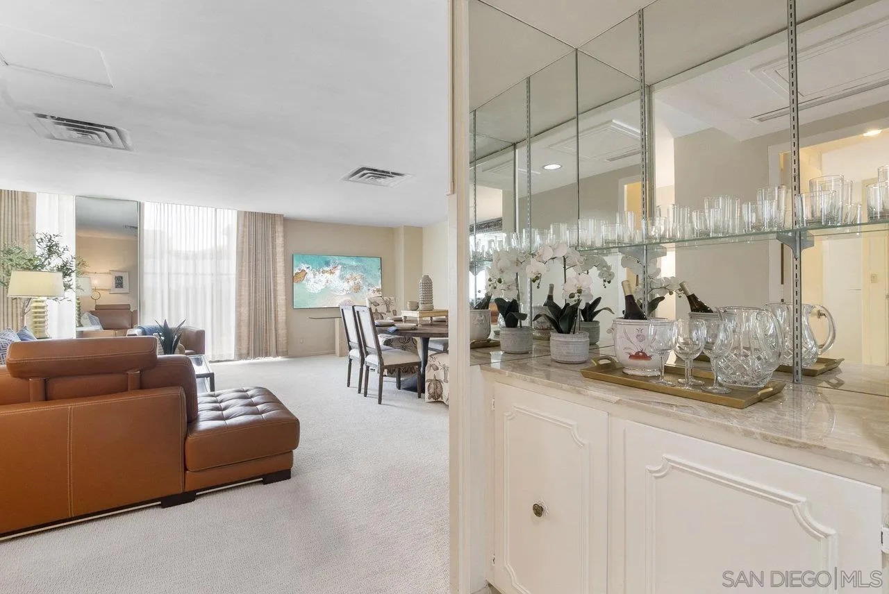 939 Coast Boulevard, Unit 4H La Jolla, CA 92037 - Photo 11 of 39 a living room with furniture and a large window