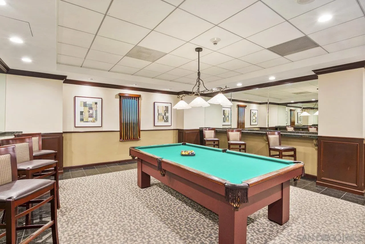 939 Coast Boulevard, Unit 4H La Jolla, CA 92037 - Photo 27 of 39 a room with pool table and windows
