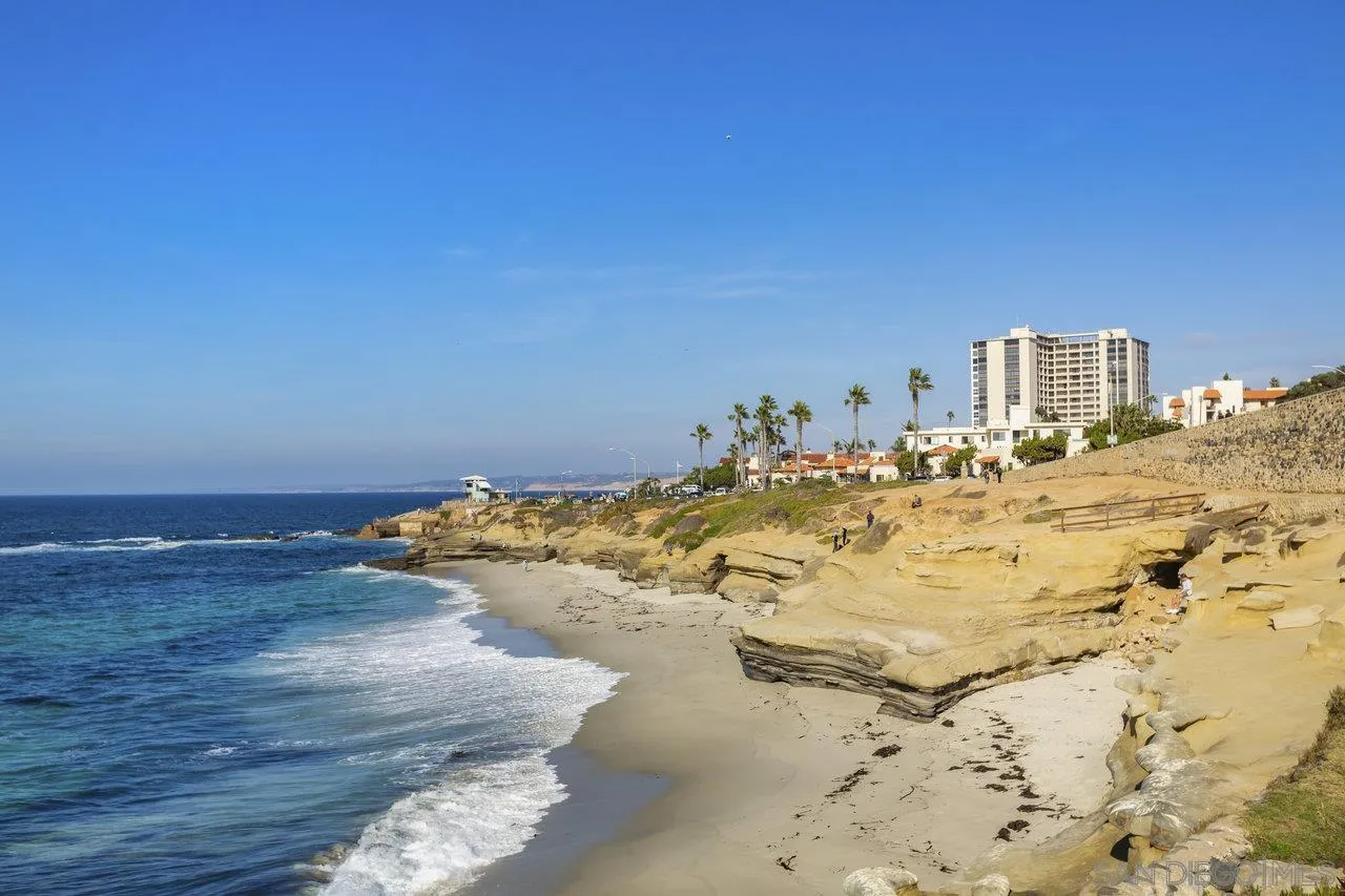 939 Coast Boulevard, Unit 4H La Jolla, CA 92037 - Photo 34 of 39 a view of water heater room with wooden floor