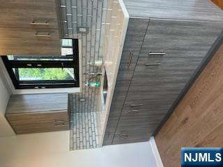 148 Undercliff Avenue, Unit 2 Edgewater, NJ 07020 - Photo 2 of 12 a sink with a window