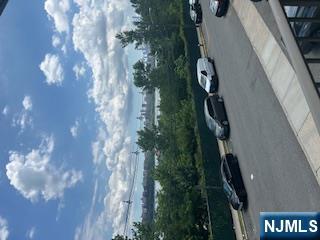 148 Undercliff Avenue, Unit 2 Edgewater, NJ 07020 - Photo 4 of 12 a car parked on the side of a road