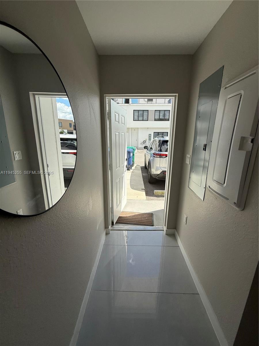26140 Southwest 146th Court Homestead, FL 33032 - Photo 6 of 7 a view of a hallway view with staircase