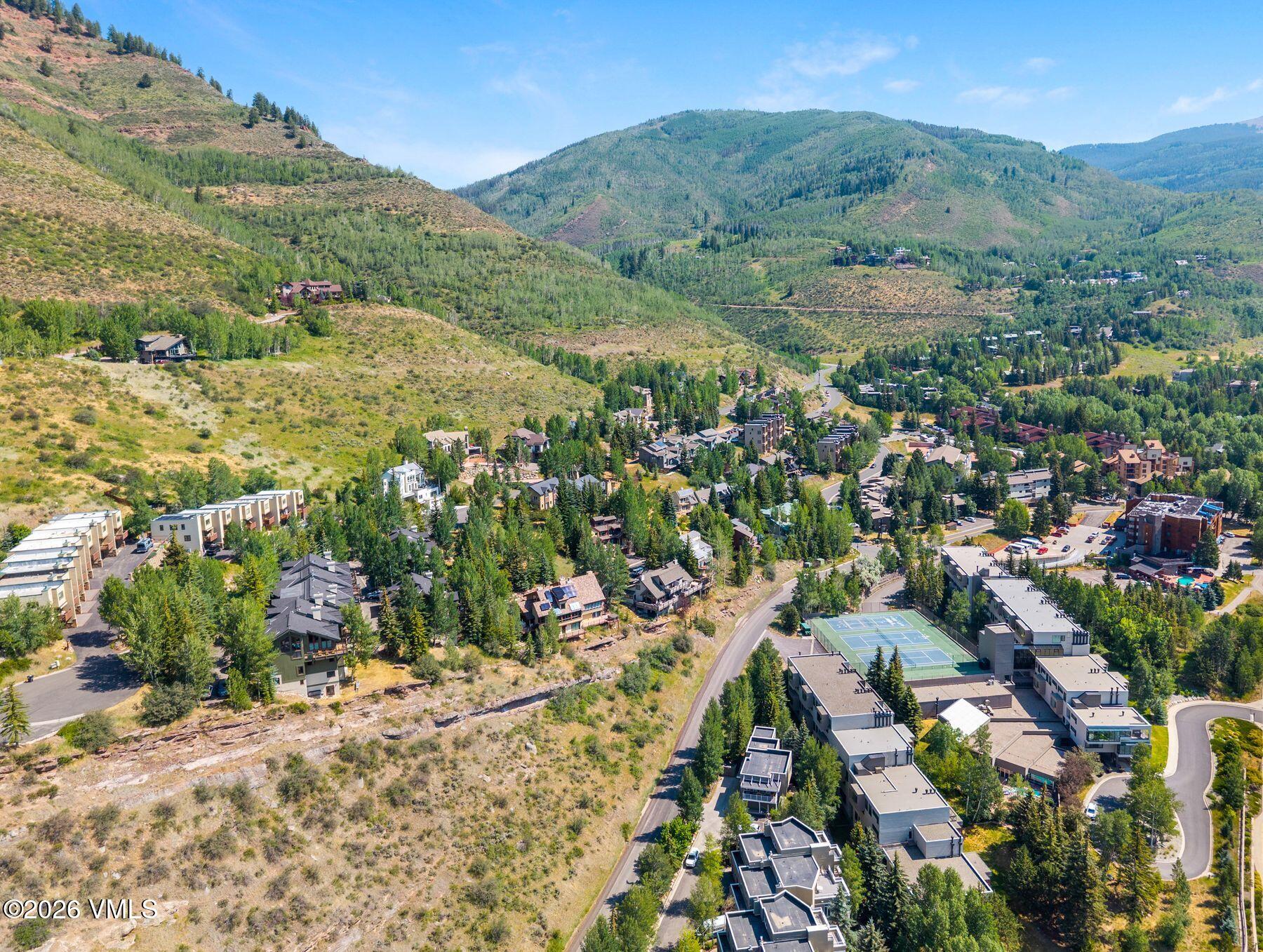 1100 North Frontage Road West, Unit 1503 Vail, CO 81657 - Photo 32 of 32 an aerial view of residential houses with outdoor space and street view