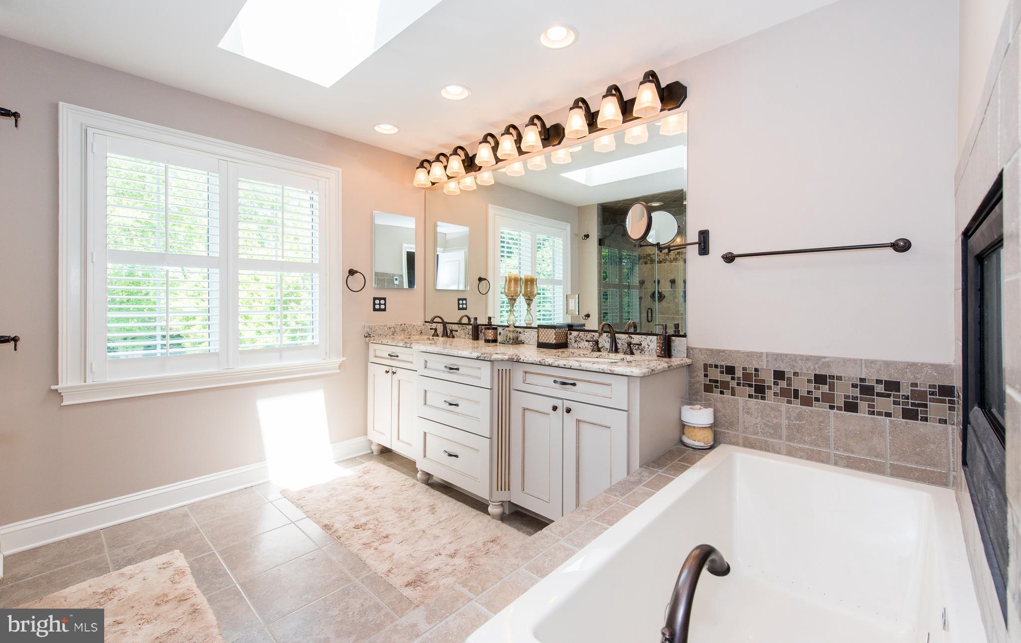 10407 Wetherburn Road Woodstock, MD 21163 - Photo 19 of 30 Master bathroom
