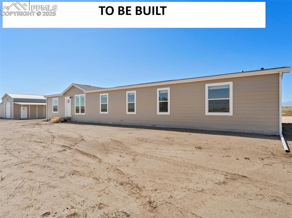 a house view with a outdoor space