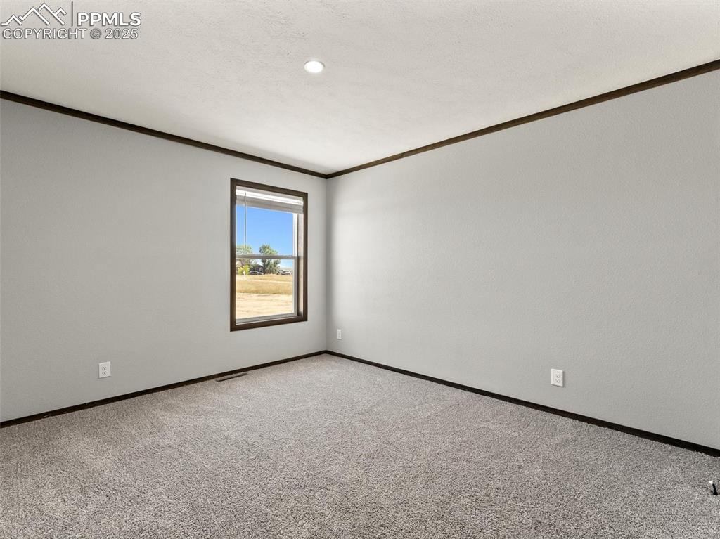 22843 Handle Road Calhan, CO 80808 - Photo 15 of 48 a view of an empty room with a window