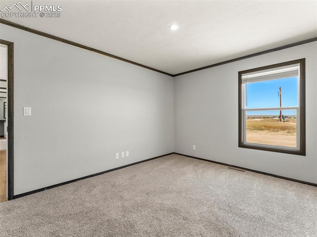 22843 Handle Road Calhan, CO 80808 - Photo 16 of 48 an empty room with a window
