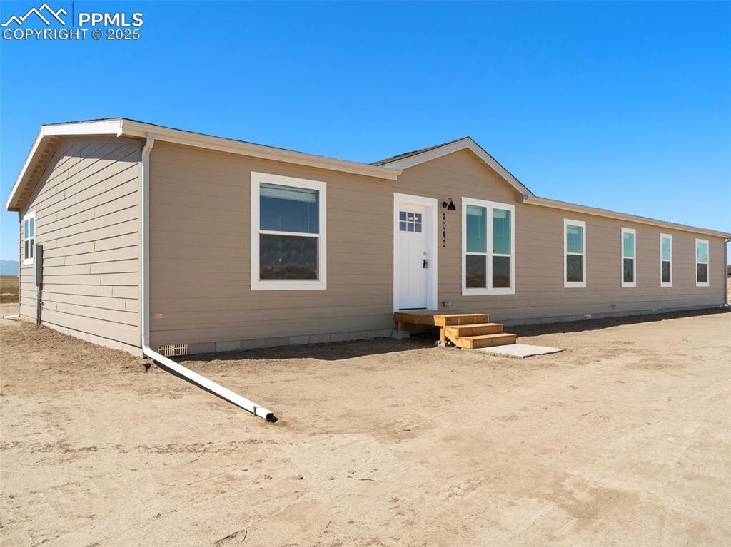 22843 Handle Road Calhan, CO 80808 - Photo 43 of 48 a backyard of a house