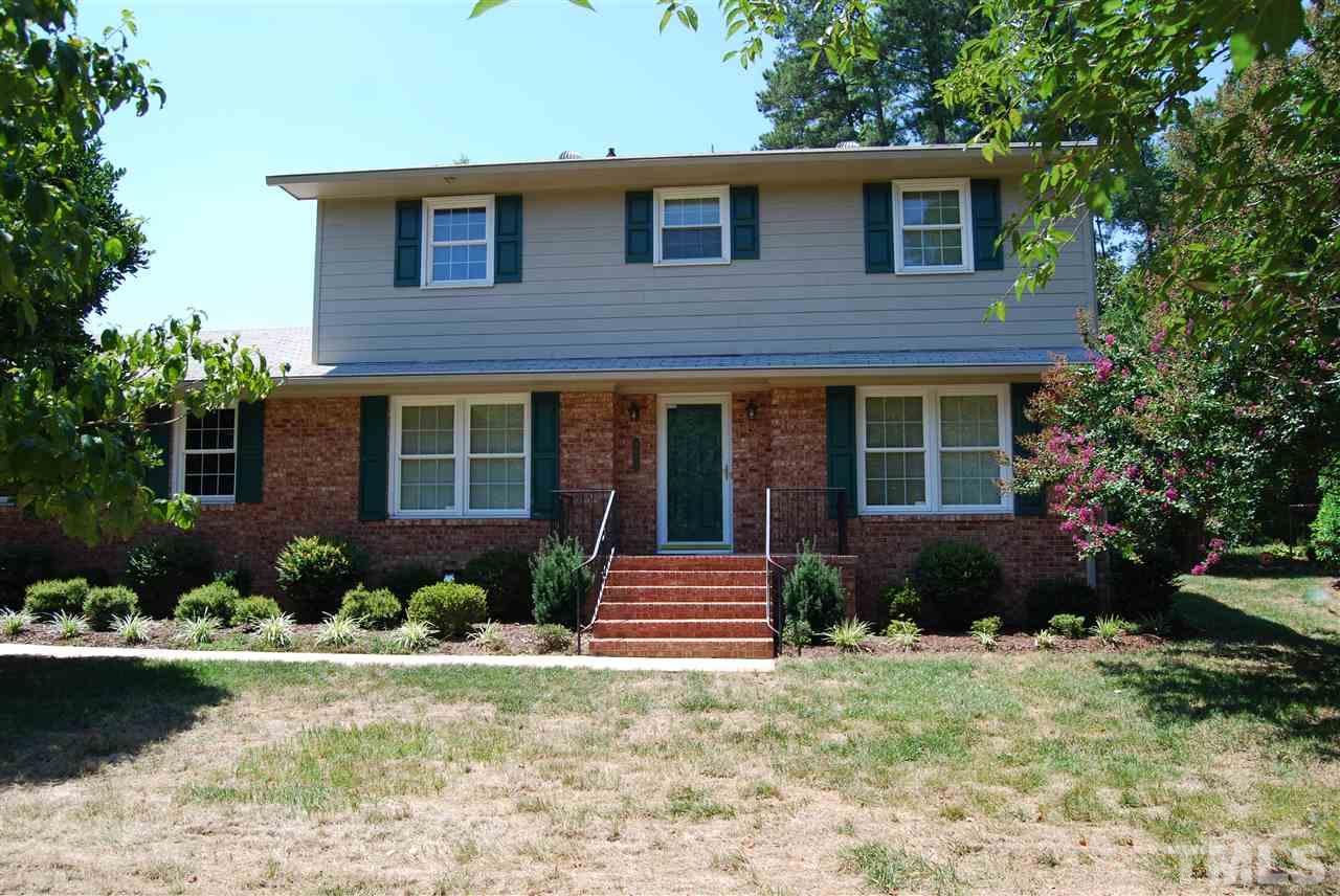 3901 Converse Drive Raleigh, NC 27609 - Photo 1 of 5 a front view of a house with garden