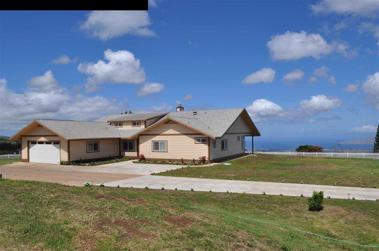 20 Pulehunui Road Kula, HI 96790 - Photo 1 of 30 a front view of a house with a yard