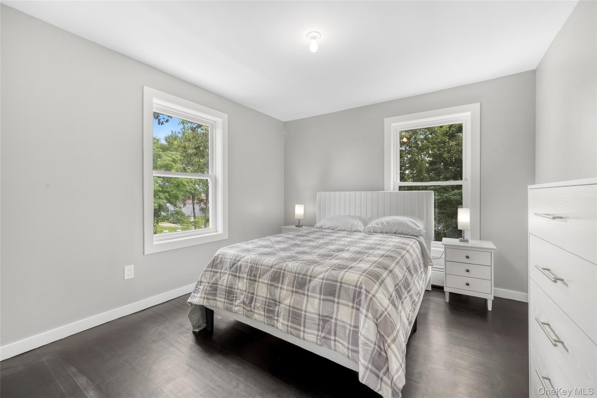 3 Sylvan Place New Rochelle, NY 10801 - Photo 13 of 29 a bedroom with a bed and a window