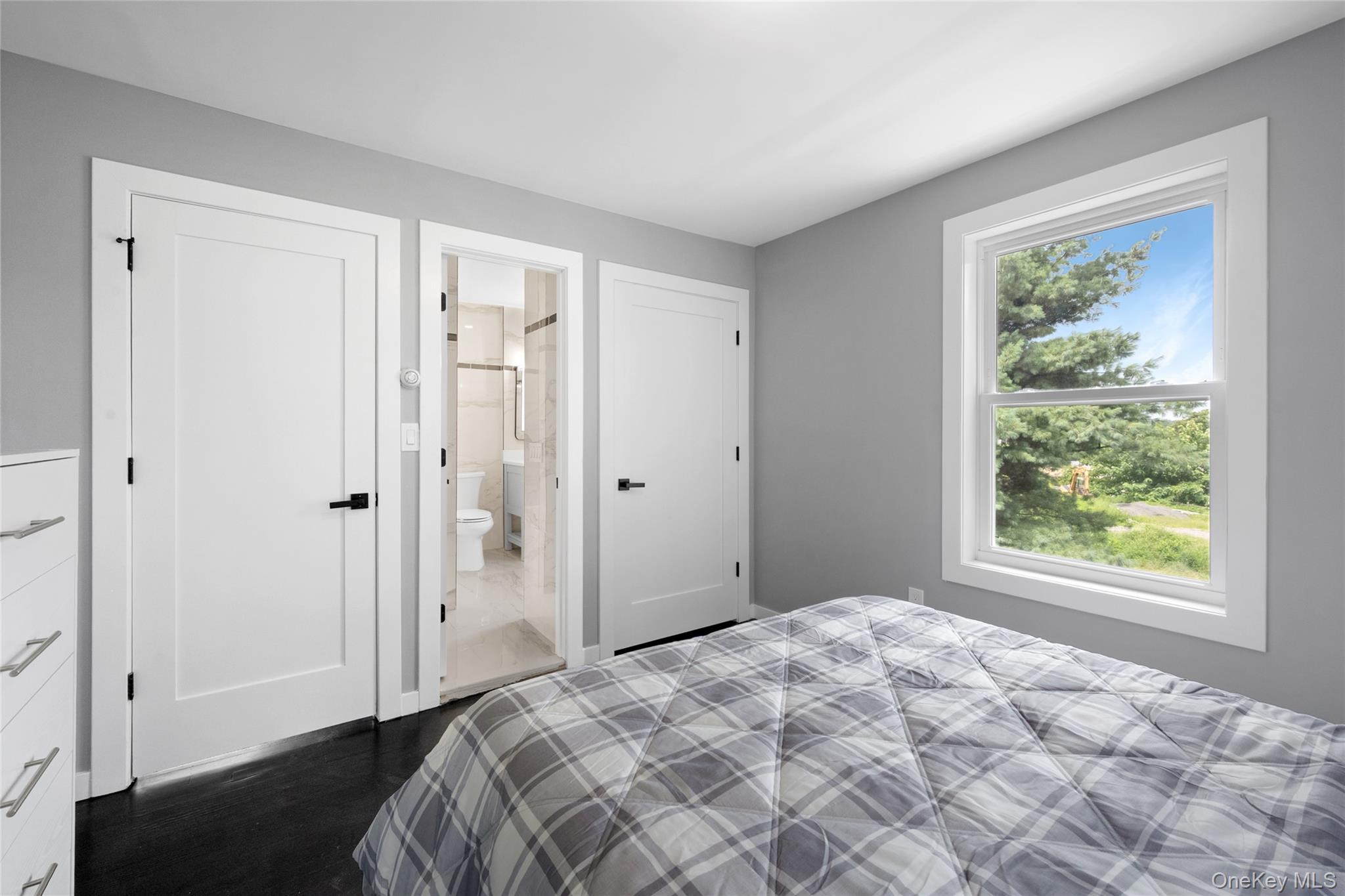 3 Sylvan Place New Rochelle, NY 10801 - Photo 14 of 29 a bedroom with a bed and a window