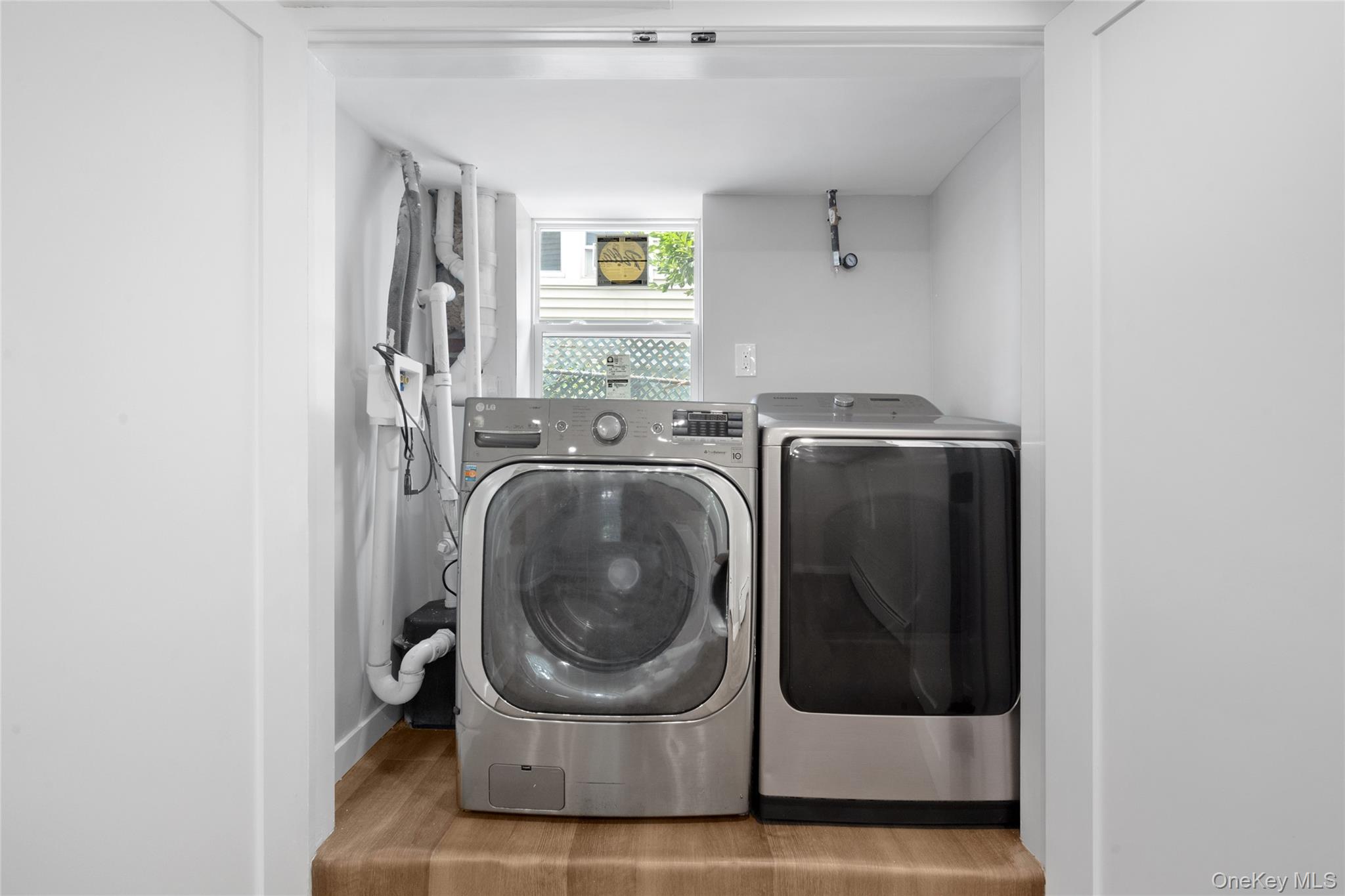 3 Sylvan Place New Rochelle, NY 10801 - Photo 18 of 29 a utility room with dryer and washer