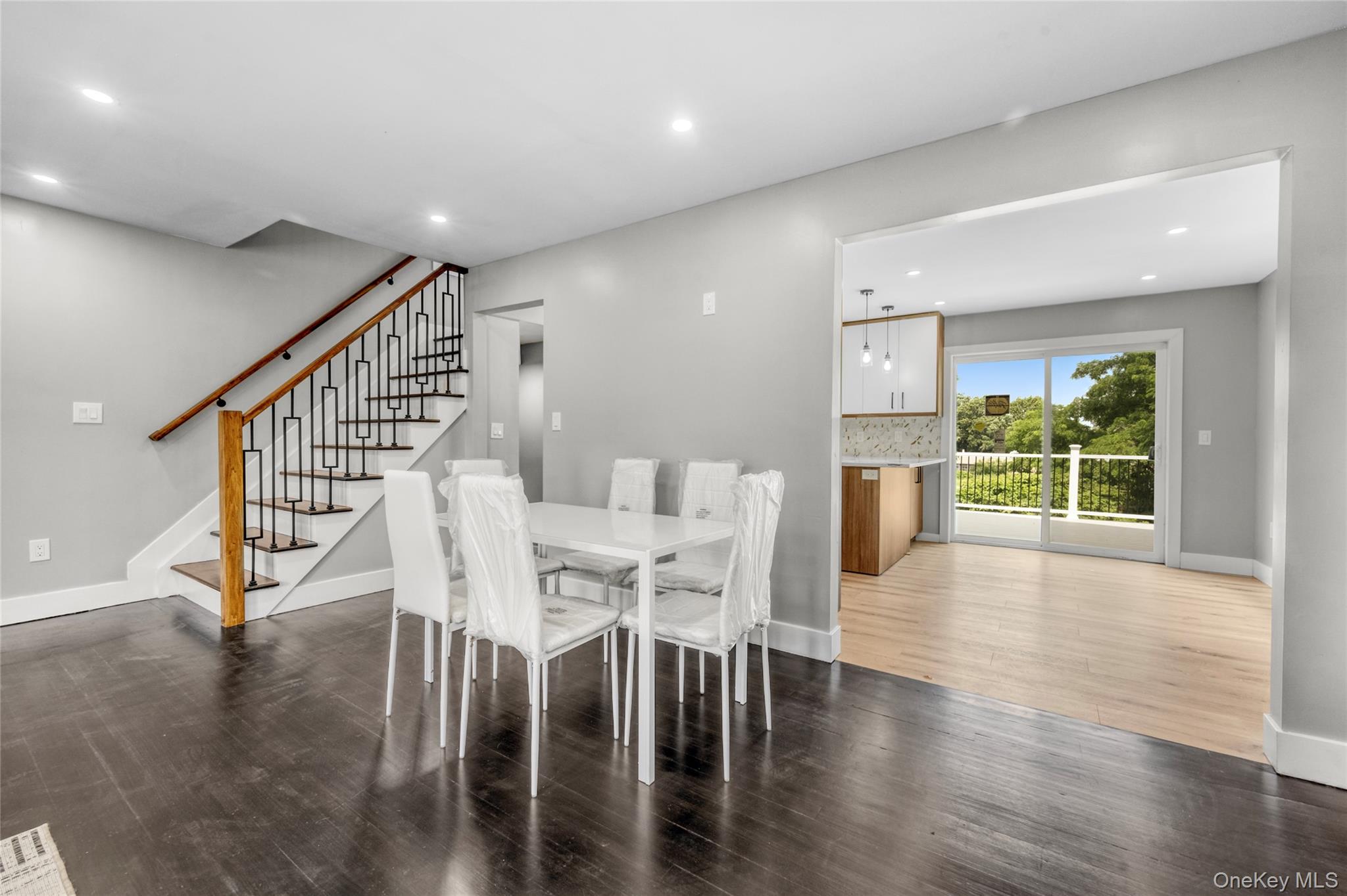 3 Sylvan Place New Rochelle, NY 10801 - Photo 3 of 29 a view of a dining room with furniture and wooden floor