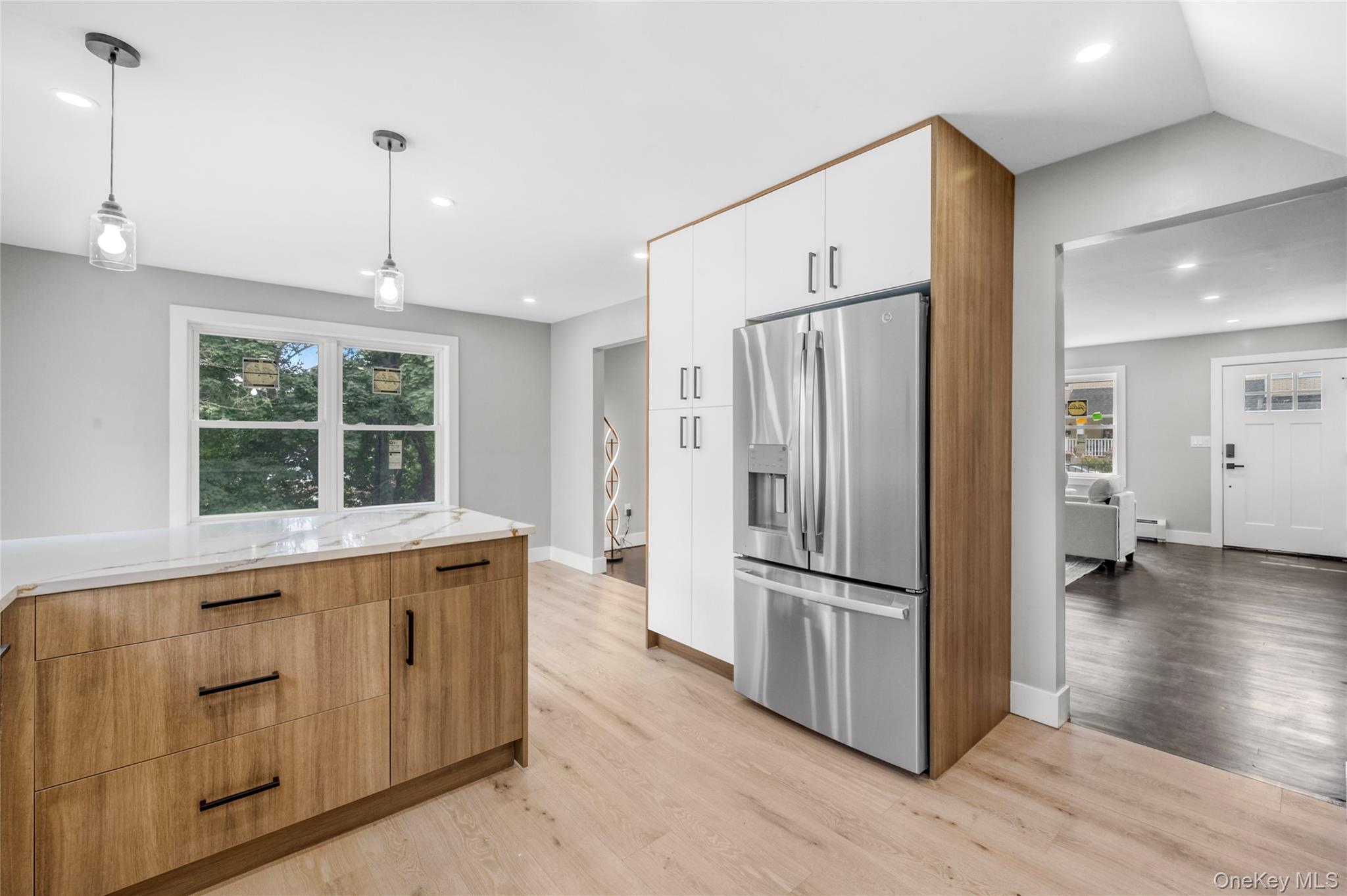 3 Sylvan Place New Rochelle, NY 10801 - Photo 9 of 29 a kitchen with stainless steel appliances granite countertop a refrigerator a sink and a stove