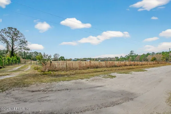 a view of a lake with a beach