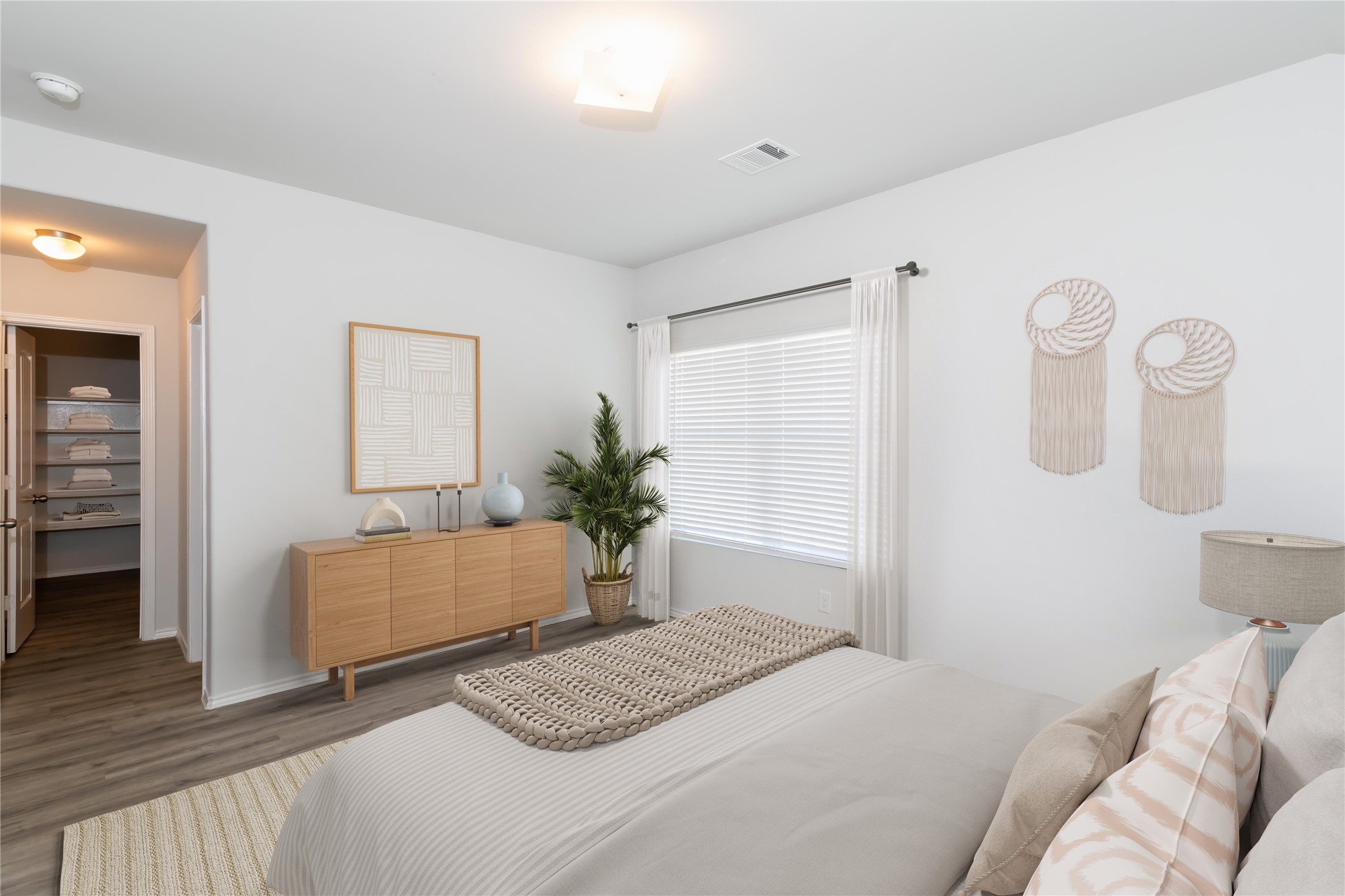 18635 Bell Ravine Drive Katy, TX 77449 - Photo 3 of 12 a bedroom with a bed and a dresser