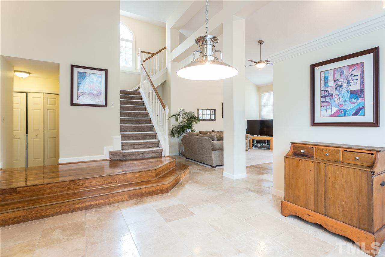 10121 Goodview Court Raleigh, NC 27613 - Photo 11 of 30 a view of a livingroom with furniture and staircase