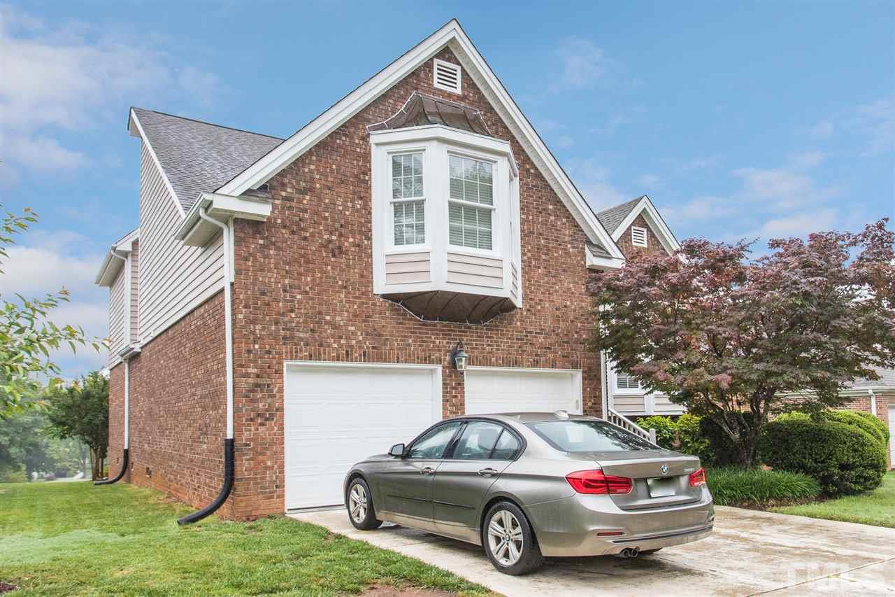 10121 Goodview Court Raleigh, NC 27613 - Photo 3 of 30 a car parked in front of a house