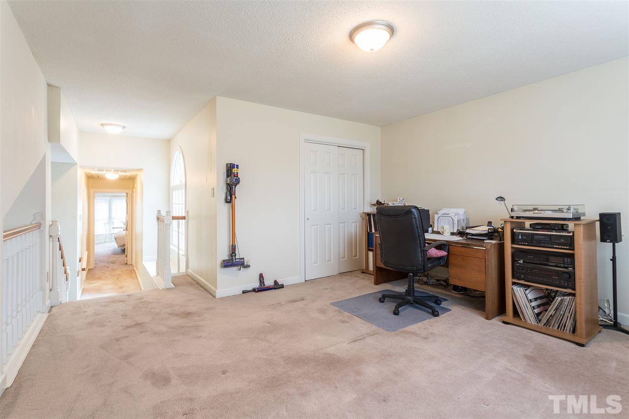 10121 Goodview Court Raleigh, NC 27613 - Photo 27 of 30 a view of a workspace with furniture