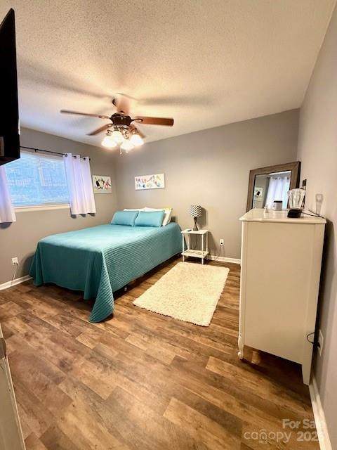 2133 Manawa Lane Fort Mill, SC 29708 - Photo 17 of 35 a bedroom with double bed and a chandelier