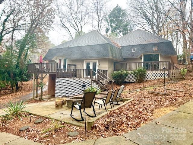 2133 Manawa Lane Fort Mill, SC 29708 - Photo 25 of 35 a patio with a table and chairs and potted plants