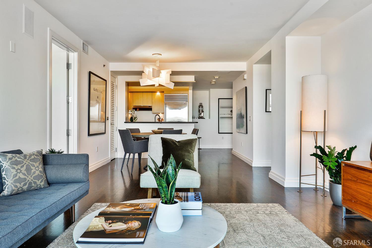 229 Brannan Street, Unit 12C San Francisco, CA 94107 - Photo 16 of 57 a living room with furniture and wooden floor