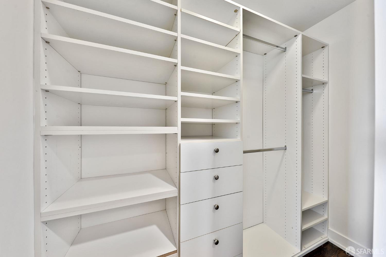229 Brannan Street, Unit 12C San Francisco, CA 94107 - Photo 26 of 57 a view of walk in closet with empty racks