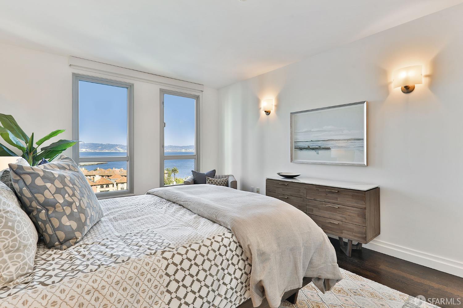 229 Brannan Street, Unit 12C San Francisco, CA 94107 - Photo 32 of 57 a bedroom with a large bed and a large window