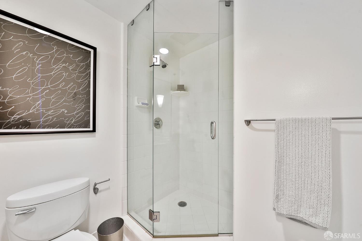 229 Brannan Street, Unit 12C San Francisco, CA 94107 - Photo 36 of 57 a bathroom with a shower and a toilet